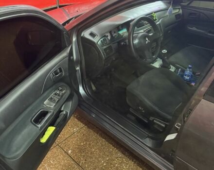 Серый Мицубиси Лансер, объемом двигателя 1.6 л и пробегом 268 тыс. км за 4600 $, фото 6 на Automoto.ua