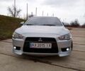 Серый Мицубиси Лансер, объемом двигателя 2 л и пробегом 243 тыс. км за 5500 $, фото 1 на Automoto.ua