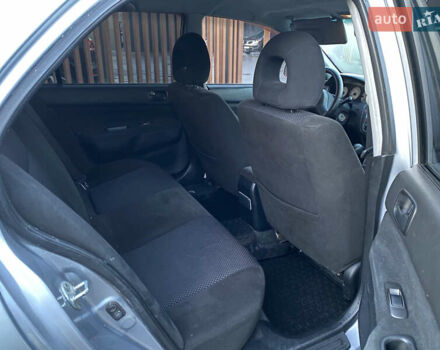 Серый Мицубиси Лансер, объемом двигателя 1.6 л и пробегом 203 тыс. км за 5200 $, фото 6 на Automoto.ua