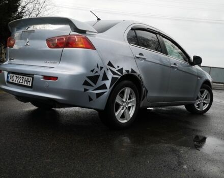 Серый Мицубиси Лансер, объемом двигателя 2 л и пробегом 260 тыс. км за 5200 $, фото 5 на Automoto.ua