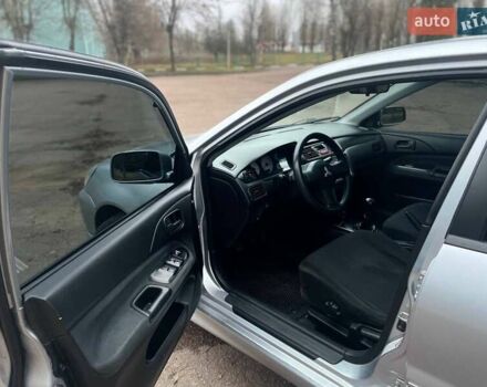 Сірий Міцубісі Lancer, об'ємом двигуна 1.6 л та пробігом 254 тис. км за 3800 $, фото 11 на Automoto.ua