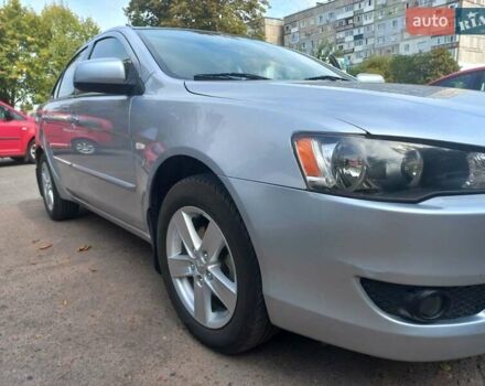 Серый Мицубиси Лансер, объемом двигателя 2 л и пробегом 103 тыс. км за 7700 $, фото 5 на Automoto.ua