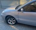 Сірий Міцубісі Lancer, об'ємом двигуна 1.6 л та пробігом 242 тис. км за 4500 $, фото 1 на Automoto.ua