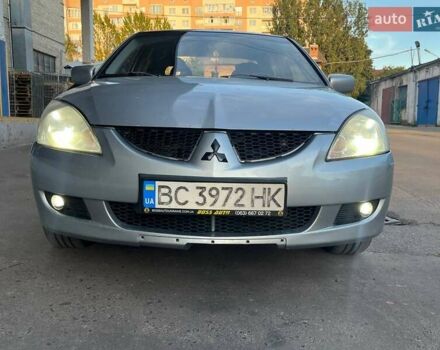 Сірий Міцубісі Lancer, об'ємом двигуна 1.58 л та пробігом 224 тис. км за 5000 $, фото 8 на Automoto.ua