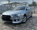Сірий Міцубісі Lancer, об'ємом двигуна 2 л та пробігом 238 тис. км за 6400 $, фото 1 на Automoto.ua