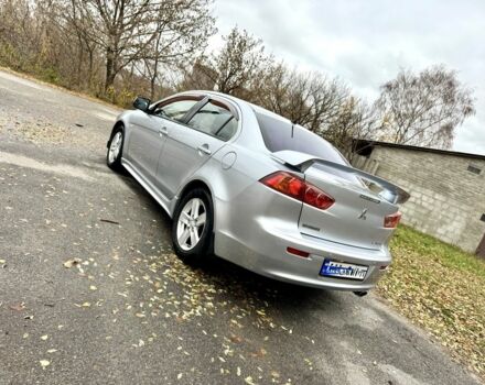 Серый Мицубиси Лансер, объемом двигателя 2 л и пробегом 225 тыс. км за 6890 $, фото 4 на Automoto.ua