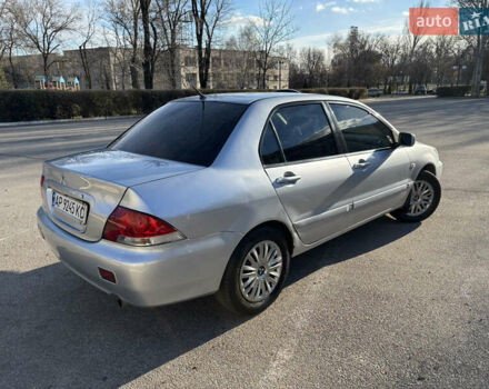 Серый Мицубиси Лансер, объемом двигателя 1.6 л и пробегом 193 тыс. км за 4000 $, фото 4 на Automoto.ua