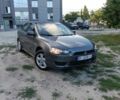 Серый Мицубиси Лансер, объемом двигателя 1.5 л и пробегом 255 тыс. км за 4900 $, фото 1 на Automoto.ua