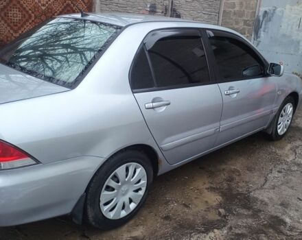 Сірий Міцубісі Lancer, об'ємом двигуна 1.6 л та пробігом 320 тис. км за 4167 $, фото 3 на Automoto.ua