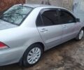 Сірий Міцубісі Lancer, об'ємом двигуна 1.6 л та пробігом 320 тис. км за 4167 $, фото 3 на Automoto.ua