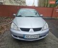 Сірий Міцубісі Lancer, об'ємом двигуна 1.58 л та пробігом 300 тис. км за 3200 $, фото 1 на Automoto.ua