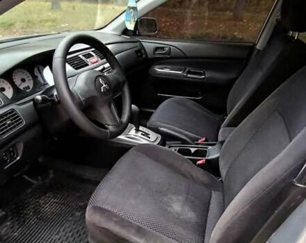 Серый Мицубиси Лансер, объемом двигателя 1.58 л и пробегом 176 тыс. км за 5000 $, фото 16 на Automoto.ua