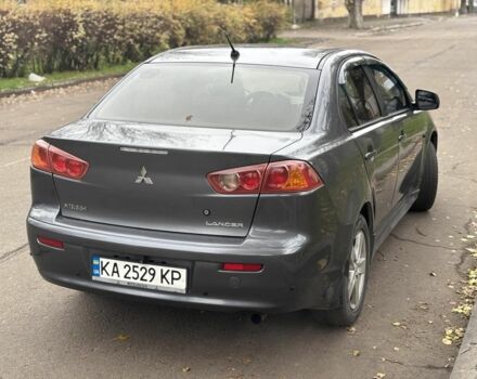 Серый Мицубиси Лансер, объемом двигателя 2 л и пробегом 240 тыс. км за 5450 $, фото 1 на Automoto.ua