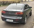 Серый Мицубиси Лансер, объемом двигателя 2 л и пробегом 240 тыс. км за 5450 $, фото 1 на Automoto.ua
