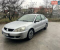 Сірий Міцубісі Lancer, об'ємом двигуна 1.58 л та пробігом 220 тис. км за 5900 $, фото 1 на Automoto.ua