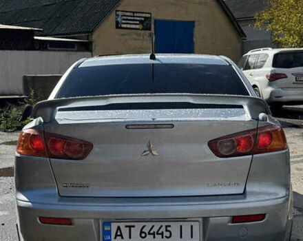 Серый Мицубиси Лансер, объемом двигателя 2 л и пробегом 190 тыс. км за 6900 $, фото 22 на Automoto.ua
