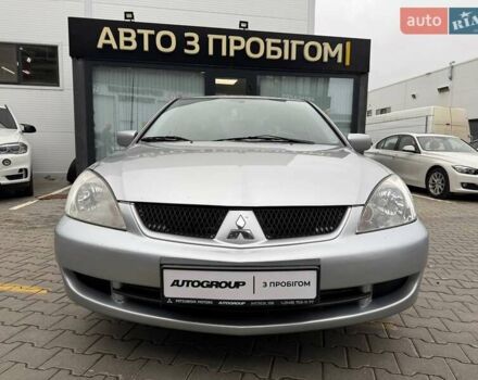 Сірий Міцубісі Lancer, об'ємом двигуна 1.6 л та пробігом 206 тис. км за 4799 $, фото 6 на Automoto.ua