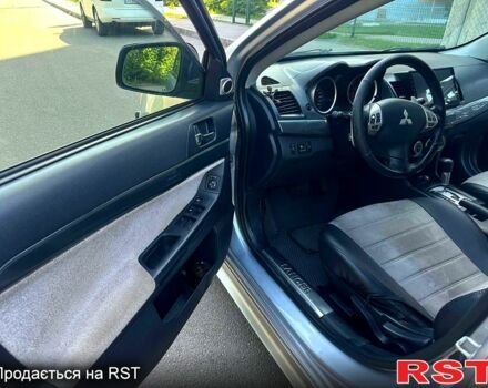 Серый Мицубиси Лансер, объемом двигателя 2 л и пробегом 240 тыс. км за 6500 $, фото 3 на Automoto.ua