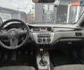 Сірий Міцубісі Lancer, об'ємом двигуна 1.6 л та пробігом 240 тис. км за 2999 $, фото 1 на Automoto.ua