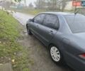 Сірий Міцубісі Lancer, об'ємом двигуна 1.58 л та пробігом 298 тис. км за 3400 $, фото 5 на Automoto.ua
