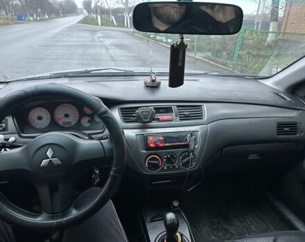 Сірий Міцубісі Lancer, об'ємом двигуна 1.6 л та пробігом 222 тис. км за 4300 $, фото 7 на Automoto.ua