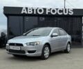 Сірий Міцубісі Lancer, об'ємом двигуна 1.5 л та пробігом 233 тис. км за 5890 $, фото 3 на Automoto.ua