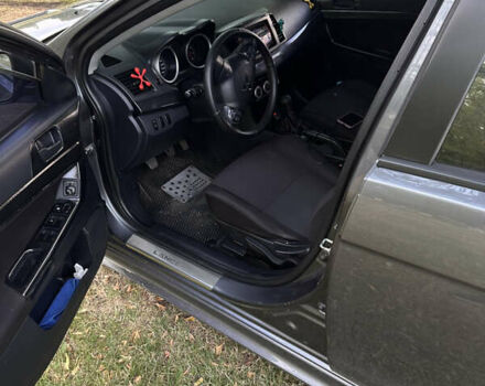 Серый Мицубиси Лансер, объемом двигателя 1.5 л и пробегом 255 тыс. км за 6000 $, фото 11 на Automoto.ua