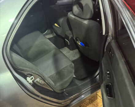 Серый Мицубиси Лансер, объемом двигателя 1.6 л и пробегом 268 тыс. км за 4600 $, фото 7 на Automoto.ua