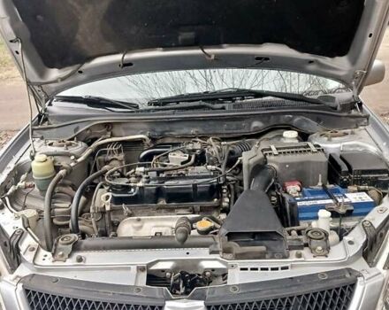 Серый Мицубиси Лансер, объемом двигателя 1.58 л и пробегом 89 тыс. км за 7500 $, фото 1 на Automoto.ua