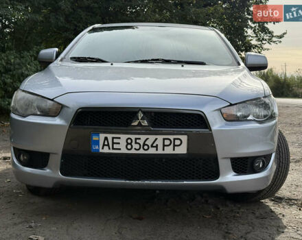 Серый Мицубиси Лансер, объемом двигателя 2 л и пробегом 175 тыс. км за 7300 $, фото 4 на Automoto.ua