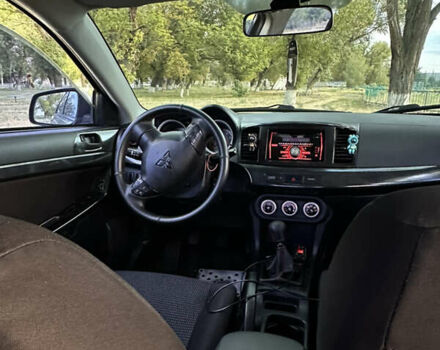 Серый Мицубиси Лансер, объемом двигателя 1.5 л и пробегом 255 тыс. км за 6000 $, фото 12 на Automoto.ua