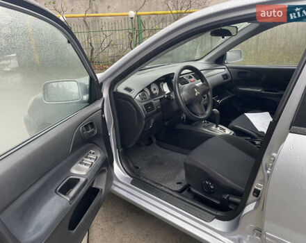 Сірий Міцубісі Lancer, об'ємом двигуна 1.58 л та пробігом 220 тис. км за 5900 $, фото 18 на Automoto.ua