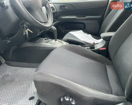 Сірий Міцубісі Lancer, об'ємом двигуна 1.58 л та пробігом 220 тис. км за 5900 $, фото 17 на Automoto.ua