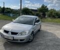 Сірий Міцубісі Lancer, об'ємом двигуна 1.6 л та пробігом 270 тис. км за 2500 $, фото 1 на Automoto.ua