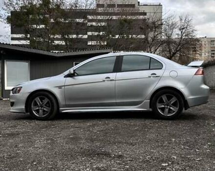 Сірий Міцубісі Lancer, об'ємом двигуна 2 л та пробігом 210 тис. км за 7100 $, фото 5 на Automoto.ua