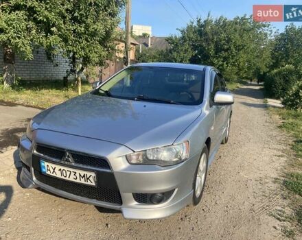 Серый Мицубиси Лансер, объемом двигателя 2 л и пробегом 266 тыс. км за 7000 $, фото 1 на Automoto.ua