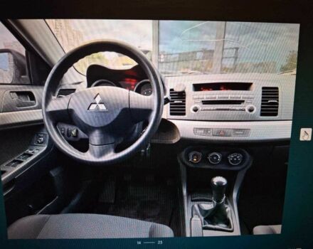 Серый Мицубиси Лансер, объемом двигателя 1.5 л и пробегом 235 тыс. км за 6500 $, фото 9 на Automoto.ua