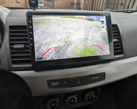 Серый Мицубиси Лансер, объемом двигателя 1.5 л и пробегом 147 тыс. км за 6700 $, фото 17 на Automoto.ua