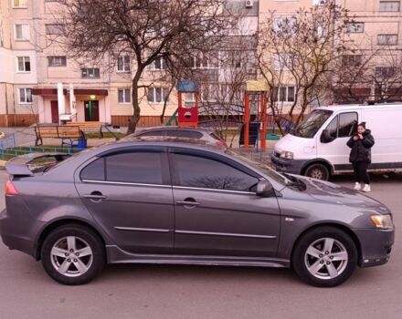 Серый Мицубиси Лансер, объемом двигателя 2 л и пробегом 345 тыс. км за 6500 $, фото 3 на Automoto.ua