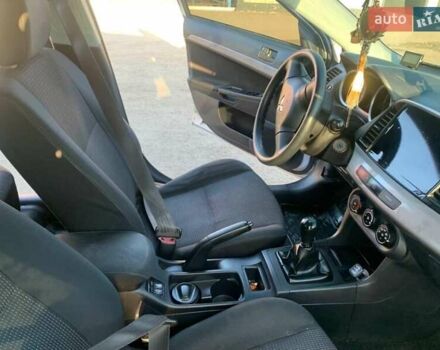 Серый Мицубиси Лансер, объемом двигателя 1.5 л и пробегом 160 тыс. км за 5300 $, фото 2 на Automoto.ua