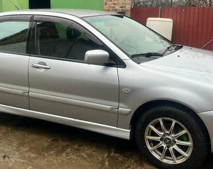 Серый Мицубиси Лансер, объемом двигателя 1.6 л и пробегом 282 тыс. км за 4699 $, фото 1 на Automoto.ua