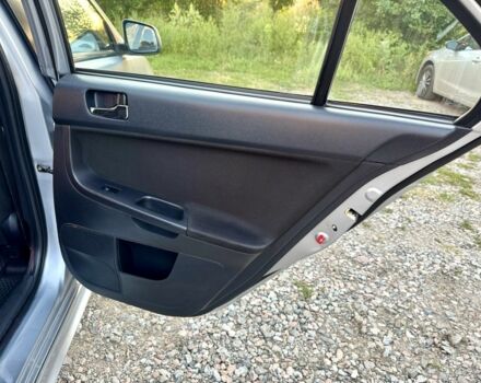 Серый Мицубиси Лансер, объемом двигателя 2 л и пробегом 223 тыс. км за 6890 $, фото 16 на Automoto.ua