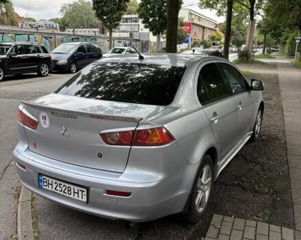 Серый Мицубиси Лансер, объемом двигателя 2 л и пробегом 183 тыс. км за 7500 $, фото 2 на Automoto.ua