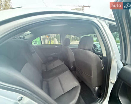 Серый Мицубиси Лансер, объемом двигателя 2 л и пробегом 220 тыс. км за 6500 $, фото 5 на Automoto.ua