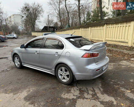 Серый Мицубиси Лансер, объемом двигателя 2 л и пробегом 265 тыс. км за 5200 $, фото 2 на Automoto.ua