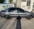 Сірий Міцубісі Lancer, об'ємом двигуна 1.6 л та пробігом 235 тис. км за 4750 $, фото 9 на Automoto.ua