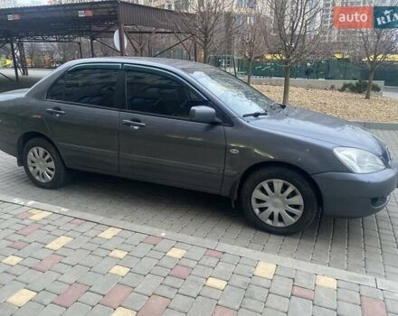 Сірий Міцубісі Lancer, об'ємом двигуна 1.6 л та пробігом 250 тис. км за 3500 $, фото 1 на Automoto.ua