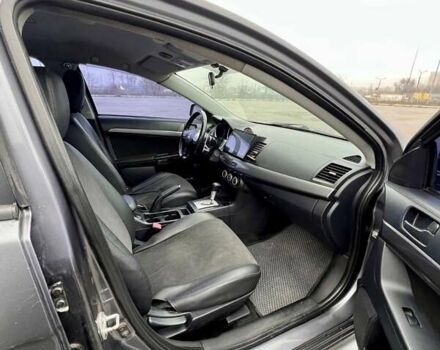 Серый Мицубиси Лансер, объемом двигателя 2 л и пробегом 203 тыс. км за 4999 $, фото 10 на Automoto.ua