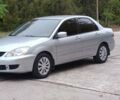 Сірий Міцубісі Lancer, об'ємом двигуна 1.6 л та пробігом 176 тис. км за 4999 $, фото 8 на Automoto.ua