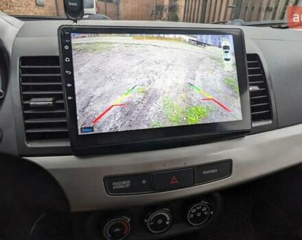 Серый Мицубиси Лансер, объемом двигателя 1.5 л и пробегом 147 тыс. км за 6700 $, фото 20 на Automoto.ua